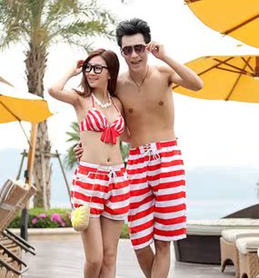 2015新款韩国情侣装沙滩裤 海滩度假游泳伴侣 男女红白条纹速干裤折扣优惠信息